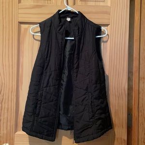 Black zip up vest. Size medium.
